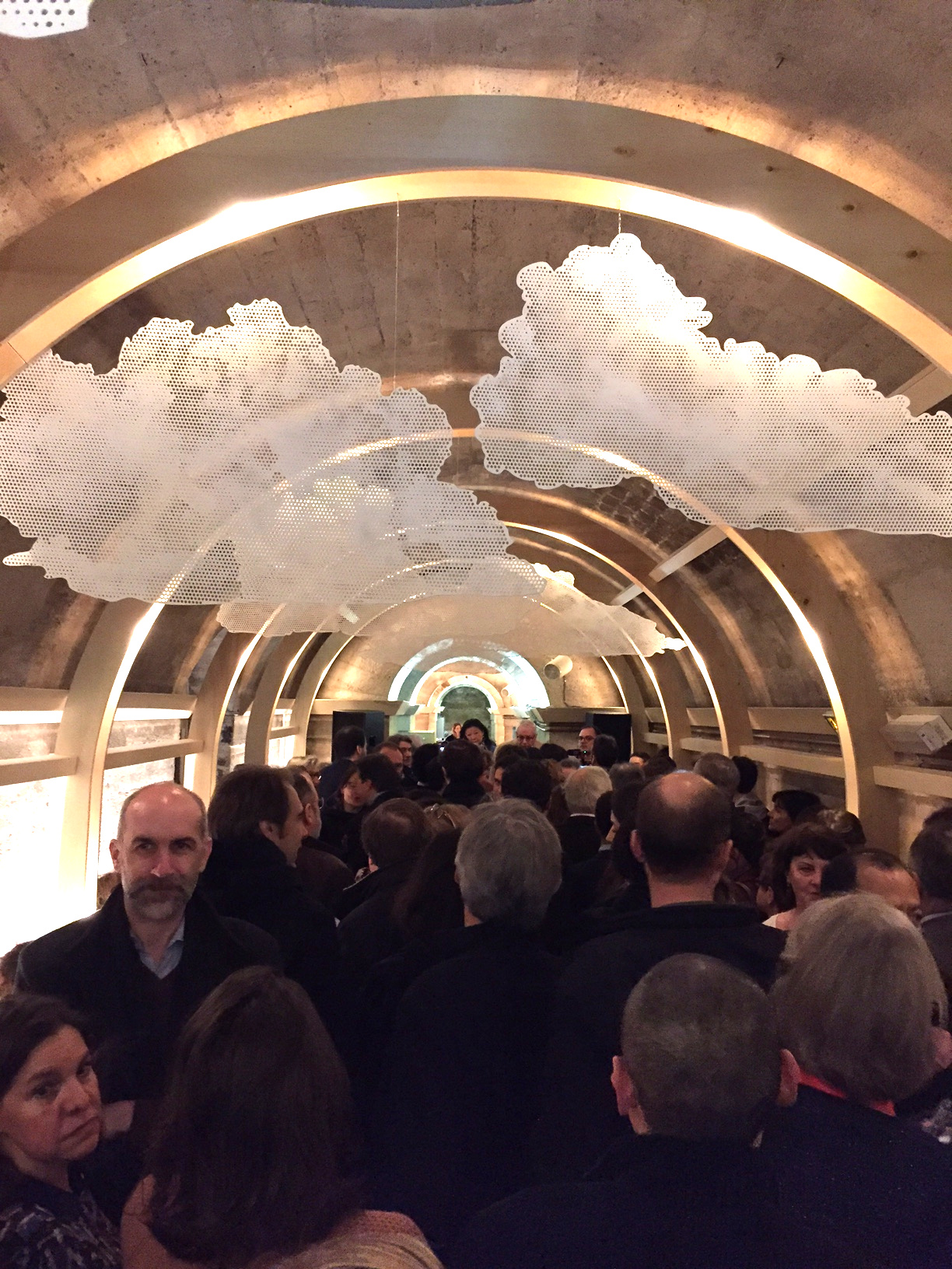 Guests gather at the new Refettorio Paris in the crypt of the L'église de la Madeleine