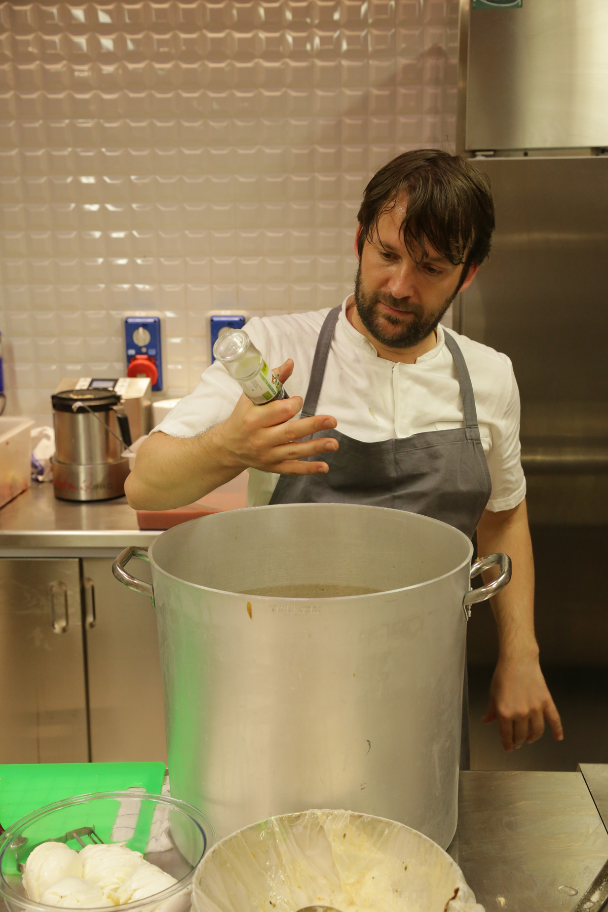 René Redzepi at Refettorio Ambrosiano, as reproduced in Bread is Gold.  Photo by Emanuele Colombo