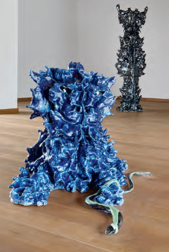Front: Blauer und Schlange, 2015 Glazed ceramics, glass Back: Gigant-Klee-Wesen (Fetisch), 2015–16 Glazed ceramics Installation view, Irden, Raketenstation Hombroich, Neuss, Germany, 2016 - Markus Karstieß