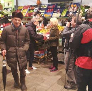 Massimo Bottura filming a 60 Minutes segment in the Mercato Storico Albinelli market in Modena, March 2018