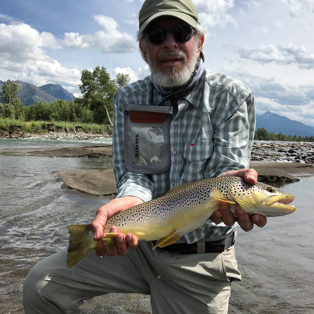 Stephen Shore with the trout he caught in the Yellowstone River. Image courtesy of Shore's Instagram