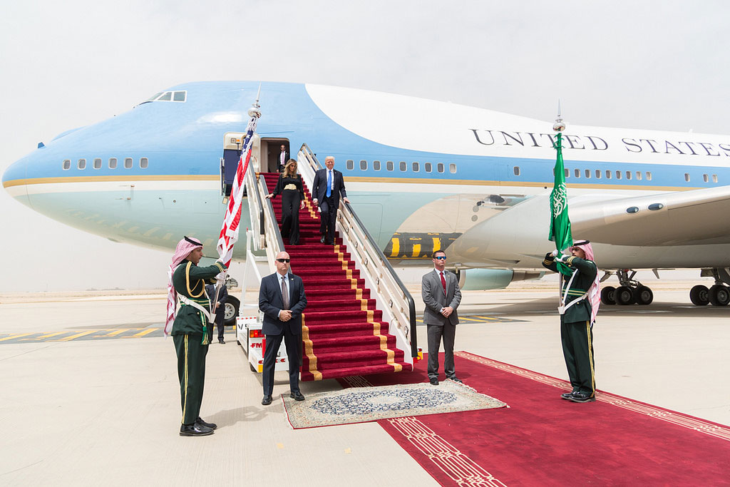 President Donald Trump and First Lady Melania Trump walk down red-carpeted stairs, Saturday, May 20, 2017, on their arrival at King Khalid International Airport in Riyadh, Saudi Arabia. (Official White House Photo by Shealah Craighead)