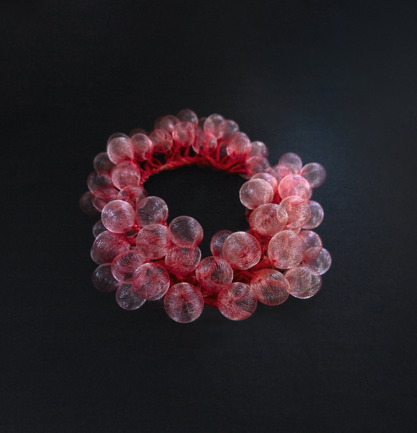 Pink Bubble Necklace, 2020, Mariko Kusumoto. Image courtesy of Mariko Kusumoto. The necklace is kōbaiiro, or plum safflower red.