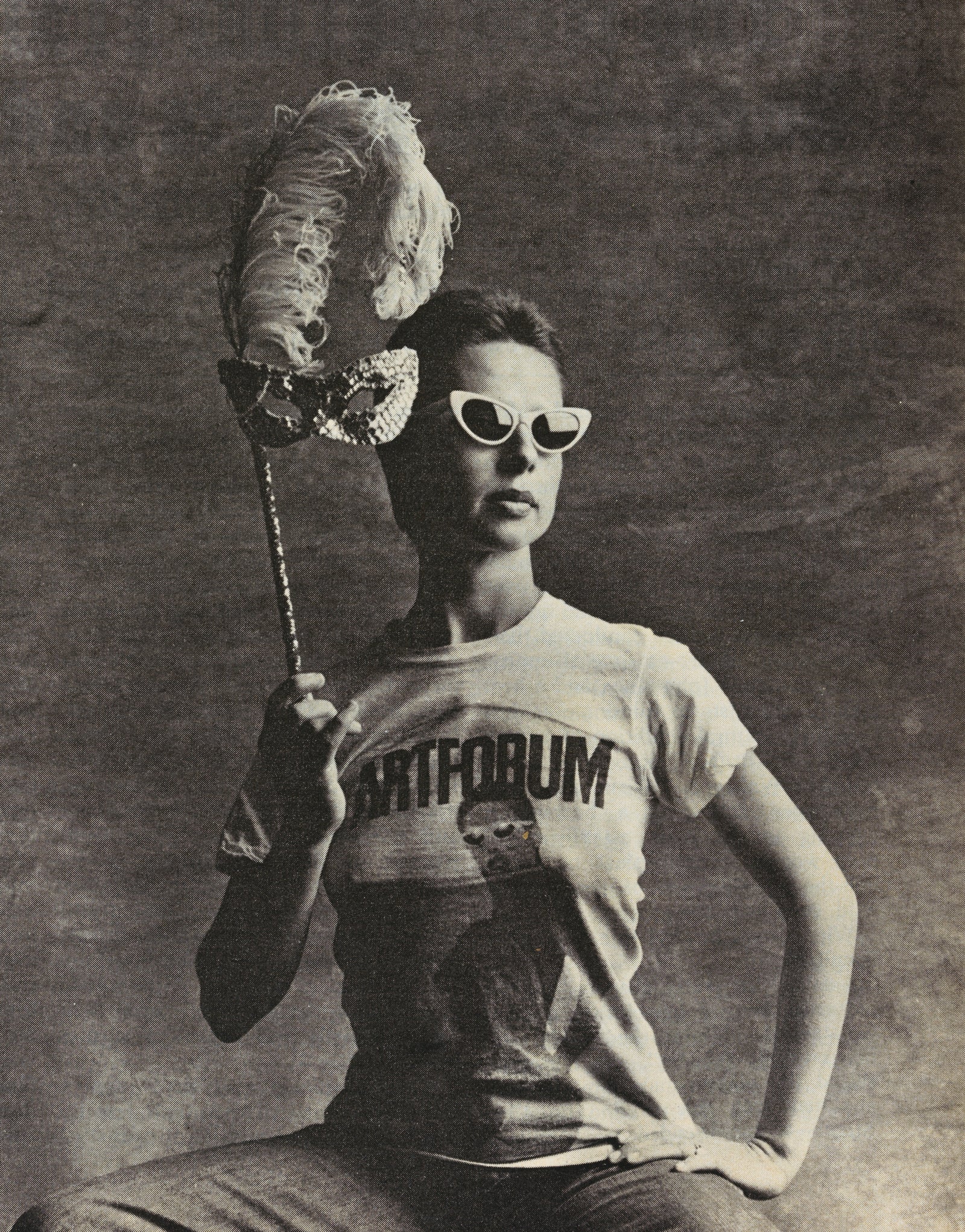 Lynda Benglis with mask, reproduced in The New Sexual Frankness: Good-By To Hearts and Flowers;, New York Magazine, 17 February 1975; 2022 Lynda Benglis / Licensed by VAGA at Artists Rights Society (ARS), NY. Photo; 1975 and 2022 Steve Myers