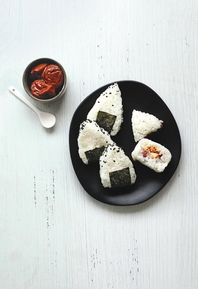 Rice balls with salmon and umeboshi, from The Gluten-Free Cookbook. All photography by Infraordinario Studio