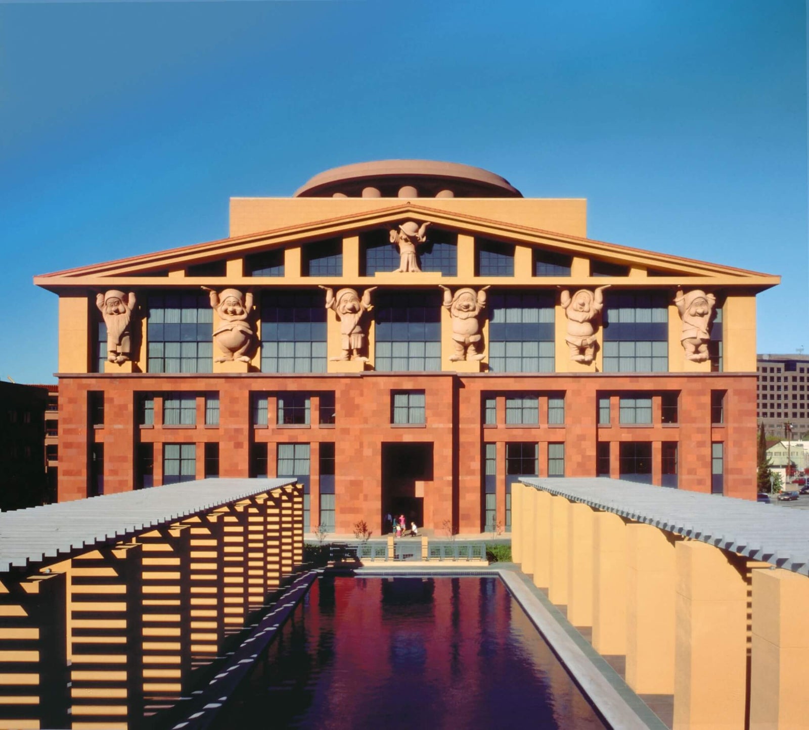 team Disney group photo diverse employees smiling in office environment