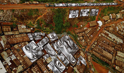 Aerial view of Kibera slum in Nairobi Kenya showing densely packed housing and urban landscape