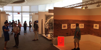 Emerging artists to watch in Miami 2014 promotional banner with vibrant abstract artwork and bold typography