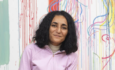 Ghada Amer interview portrait woman artist colorful background