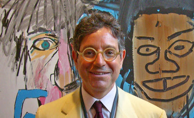 Jeffrey Deitch Miami interview portrait with colorful art background