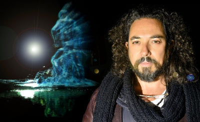 Eyal Gever space art interview portrait with abstract digital artwork background