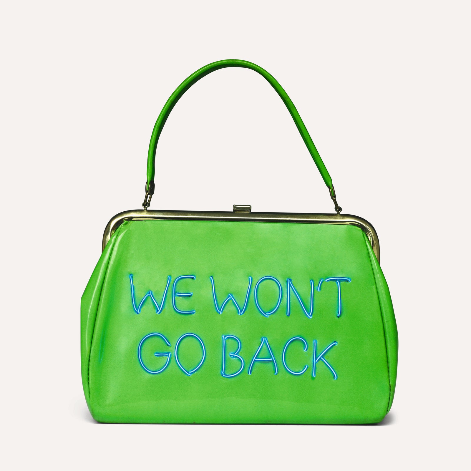 Michele Pred, We Won&#8217;t Go Back, 2022. Vintage purse with electroluminescent wire. 12 &#215; 11 &#215; 4 in. (30.5 &#215; 27.9 &#215; 10.2 cm). Artwork &#169; and courtesy the artist / courtesy Nancy Hoffman Gallery.