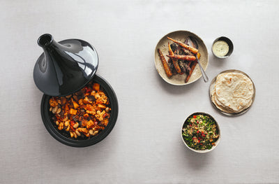 Vegetable Tagine, Tzatiki, Flatbread, Herbed Quinoa, Spicy Roasted Carrots with Black Gomasio. Photography by Hildur Ársælsdóttir