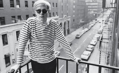 Stephen Shore photograph of Andy Warhol in a colorful setting