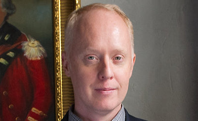 Ed Winkleman magazine interview portrait with blurred background