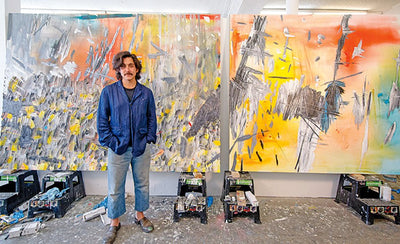 Dashiell Manley contemporary artist portrait with colorful abstract background