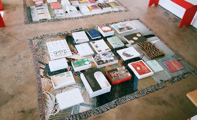 bookstore interior with shelves full of books and a person browsing