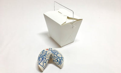 for good luck collect jiha moons ceramic fortune cookies on wooden table with blurred background