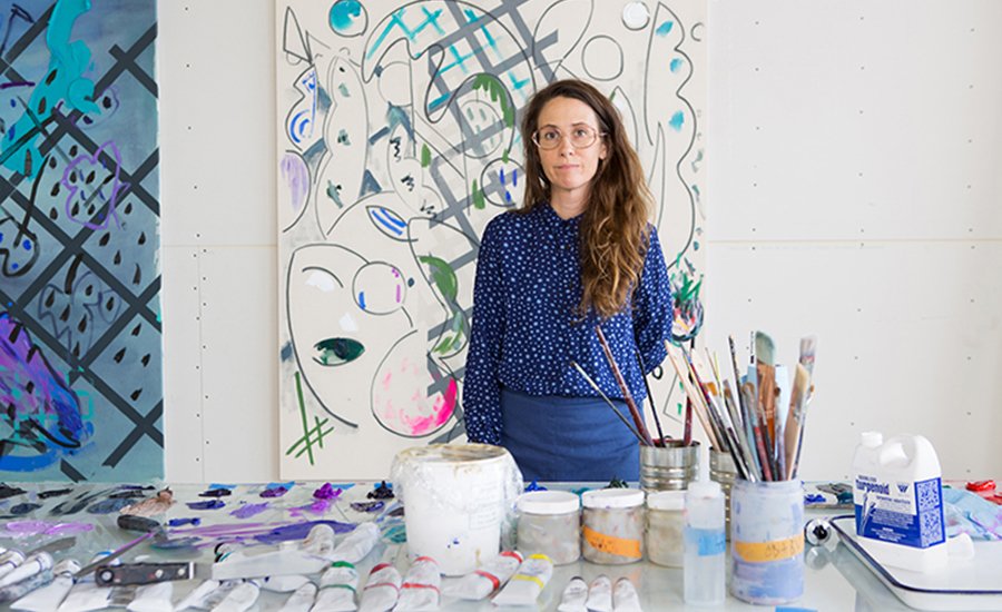 Laura Owens artist portrait with colorful abstract painting background