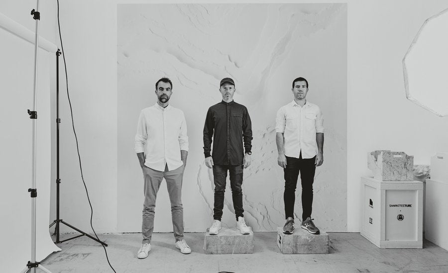 Snarkitecture white geometric architectural installation with large abstract shapes in gallery space