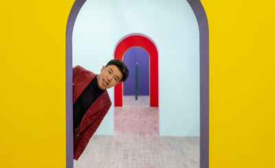 Michael Xufu Huang portrait with art gallery background consumption habits concept image