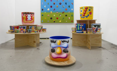 5 reasons to sew seeds in Ben Sanders painted pots colorful gardening containers with seeds and flowers image