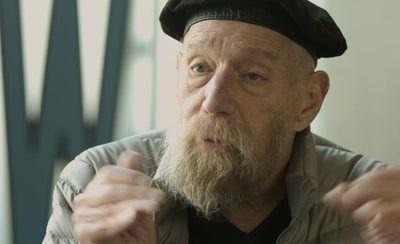 Help Lawrence Weiner create his art banner with abstract colorful shapes and text on a white background