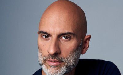 Paul Gulati of Universal Design Studio interview for The Art for Home with portrait and studio background