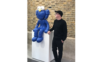 New KAWS Serpentine art exhibition promotional banner with vibrant abstract sculpture and event details