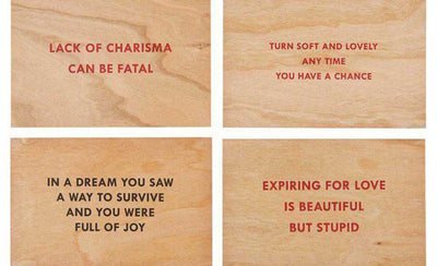 Jenny Holzer artwork exhibition banner featuring text-based art with abstract background colors