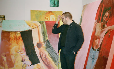 Anthony Cudahy artist portrait with colorful abstract painting background
