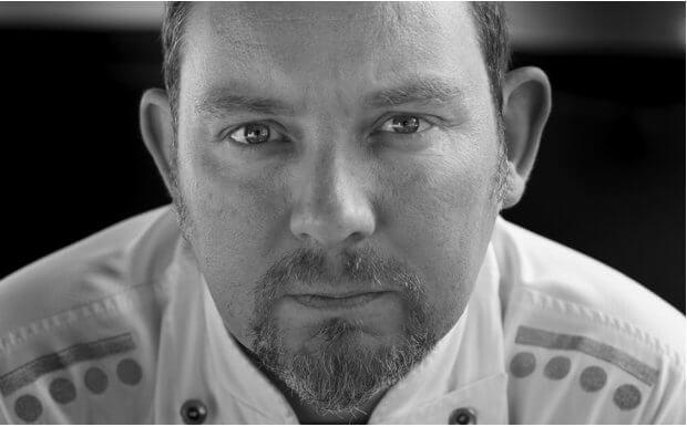portrait of albert adria professional chef culinary expert in kitchen environment