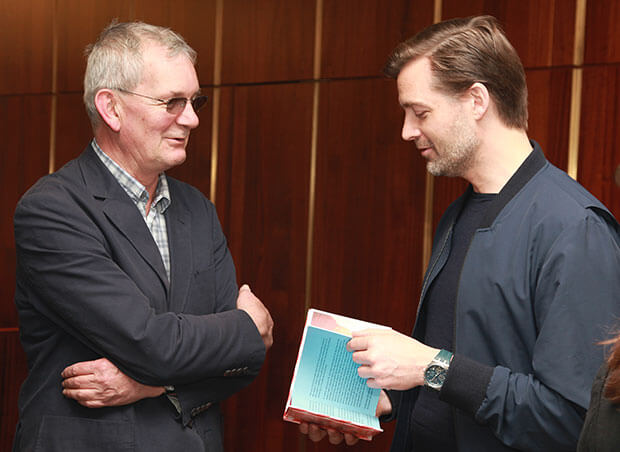 martin parr book launch event photography crowd and speaker on stage