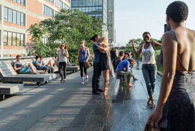 highline lead rope coiled on wooden surface with metal clasp visible