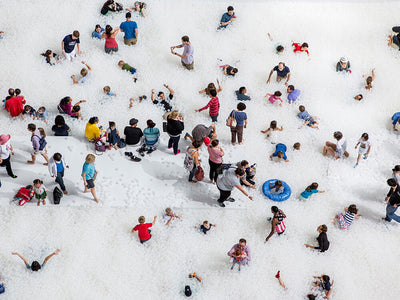 Snarkitecture The Beach installation at DC by Noah Kalina large white sculptural art with people interacting on it