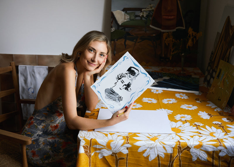 Jenny Walton holds limited edition artwork