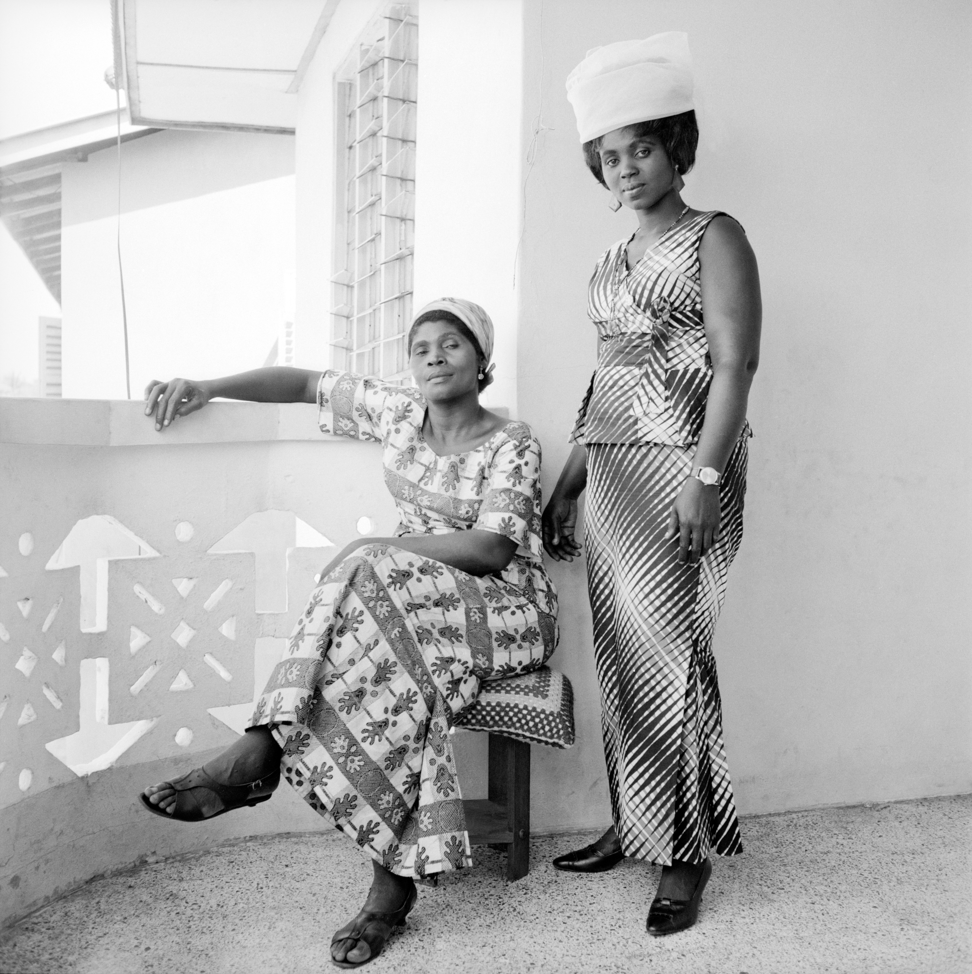 James Barnor, Two Sisters in-law, Florence and Gifty, 1973/74, Lambda print, 70 x 70 cm. Edition of 10 plus 1 artist's proof (#1/10). Courtesy of October Gallery.