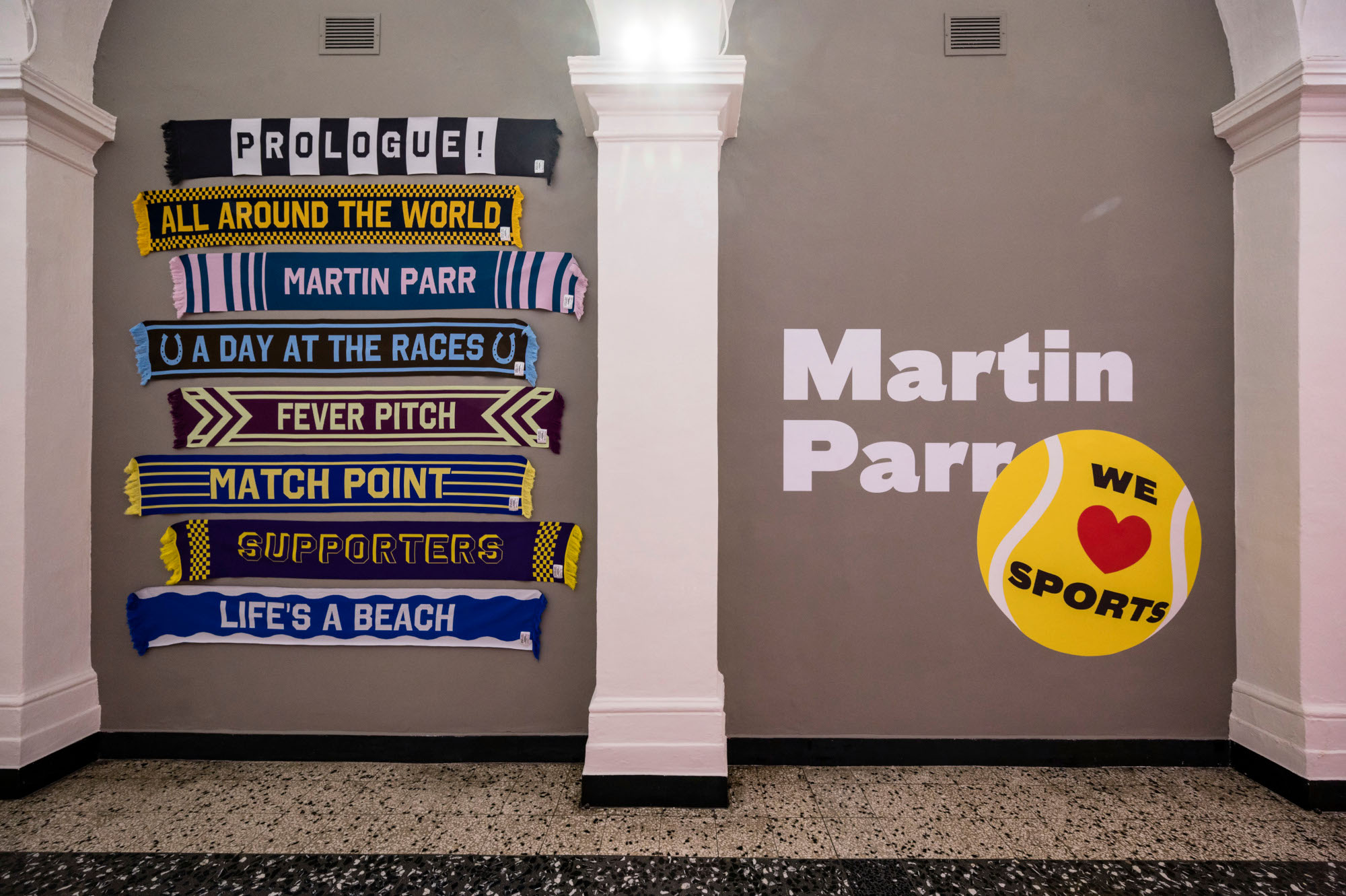 Installation view of Martin Parr. We Love Sports. Installation photograph by Andrea Guermani