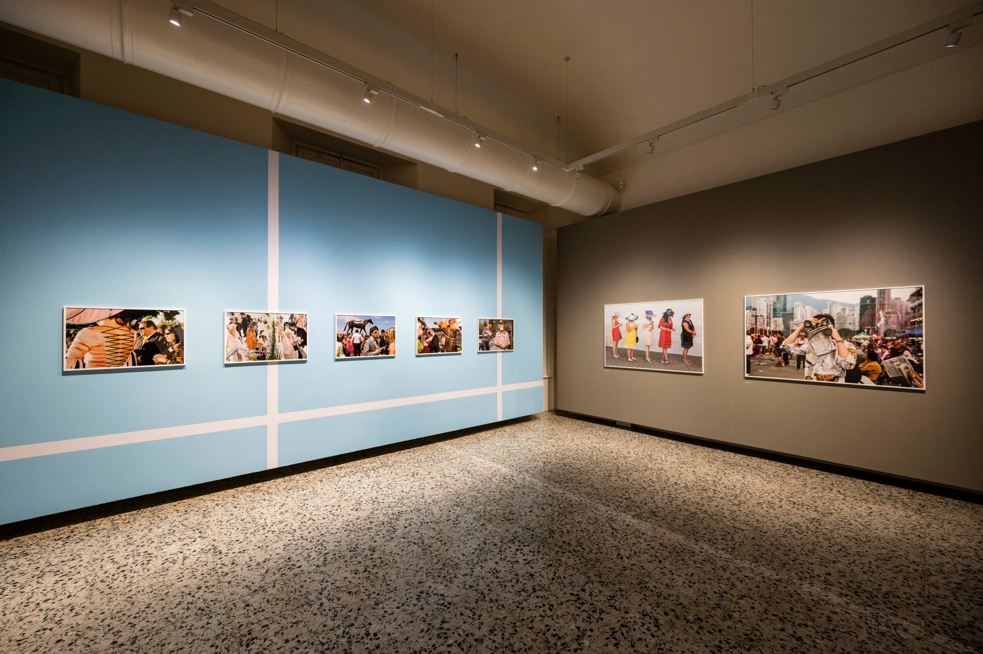 Installation view of Martin Parr. We Love Sports. Installation photograph by Andrea Guermani