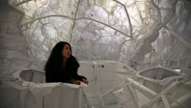 Yin Xiuzhen inside her installation Heterotopic Cavity, 2009