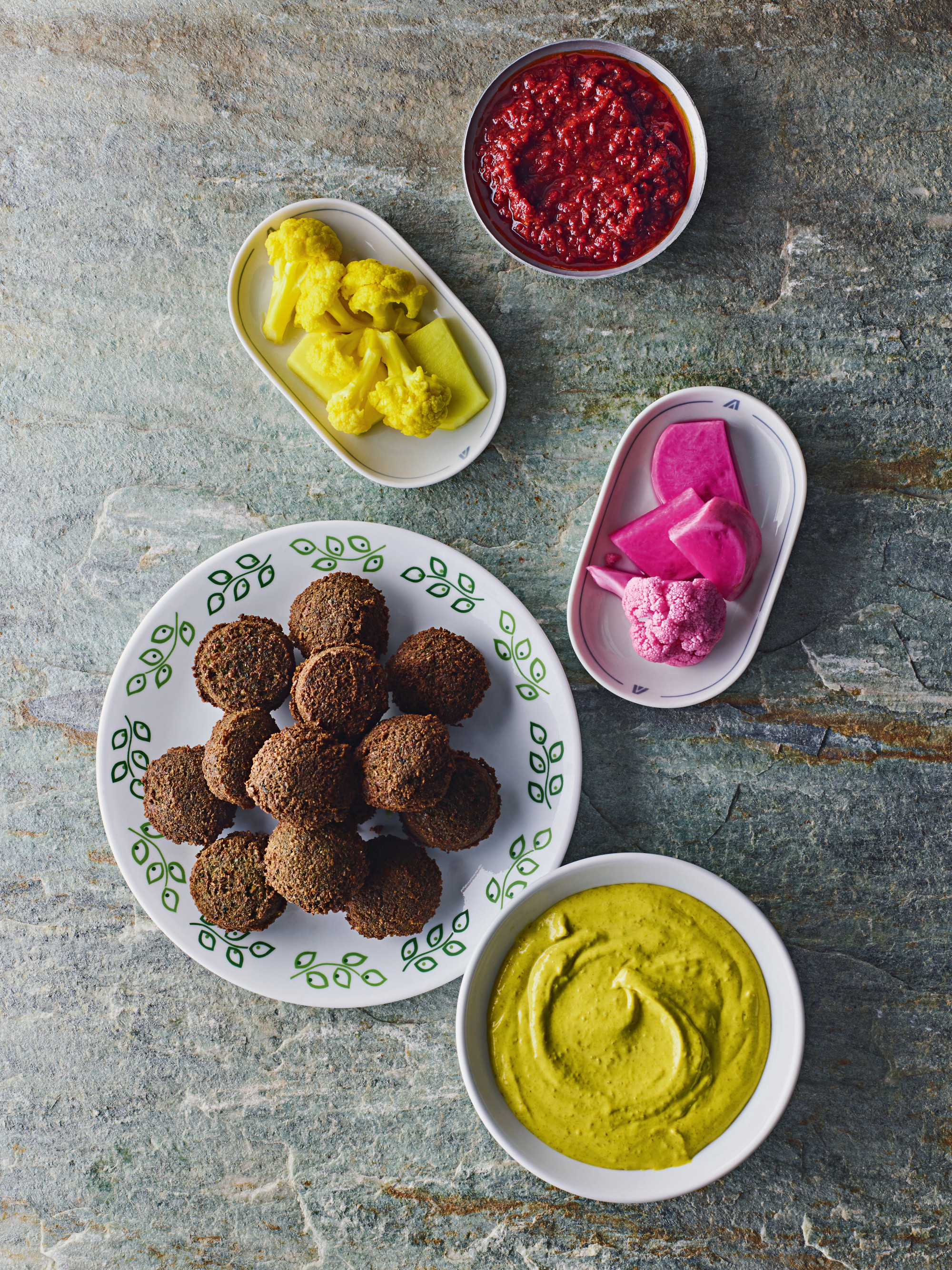 Basics: Shattah Chili Paste; Amba Tahini; Beet, Cauliflower, and Turnip Pink Pickles; Turmeric and Fenugreek Quick Pickles; Split Pea Falafel. Photography by Dan Perez