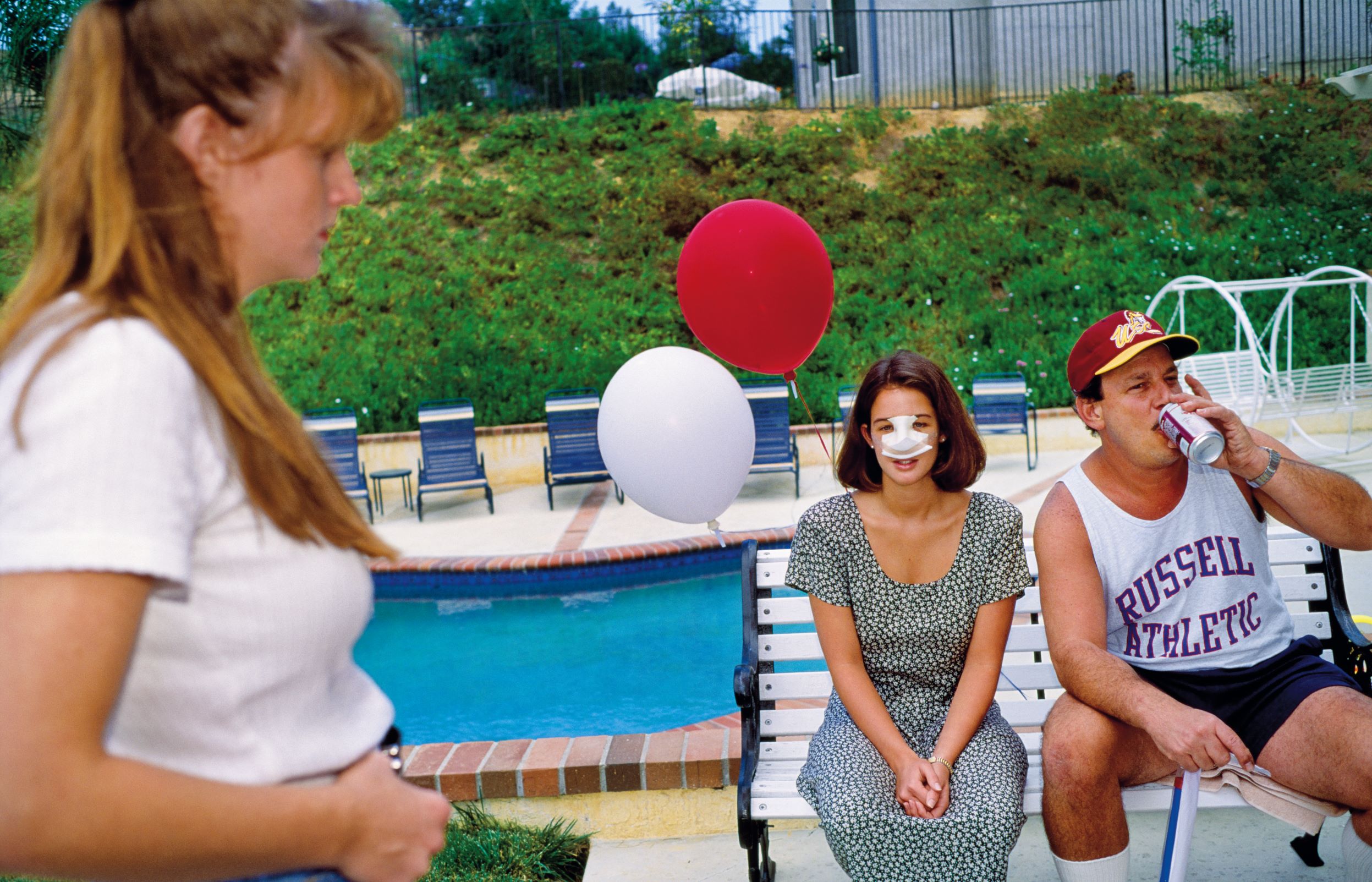 Lindsey, 18, at a Fourth of July party three days after her nose job,  Calabasas, California, 1993. Five of her  friends at high school have already had plastic surgery. From Generation Wealth by Lauren Greenfield