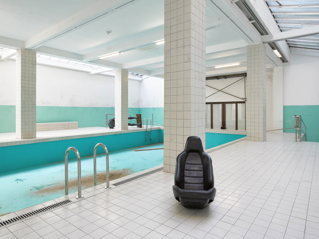 The Whitechapel Pool, 2018; wood, tiles, latex, polished stainless steel, linoleum, paint, 600 x 1450 x 2340 cm, installation view of 'This Is How We Bite Our Tongue', Whitechapel Gallery, London, 2018. Artwork © Elmgreen & Dragset 