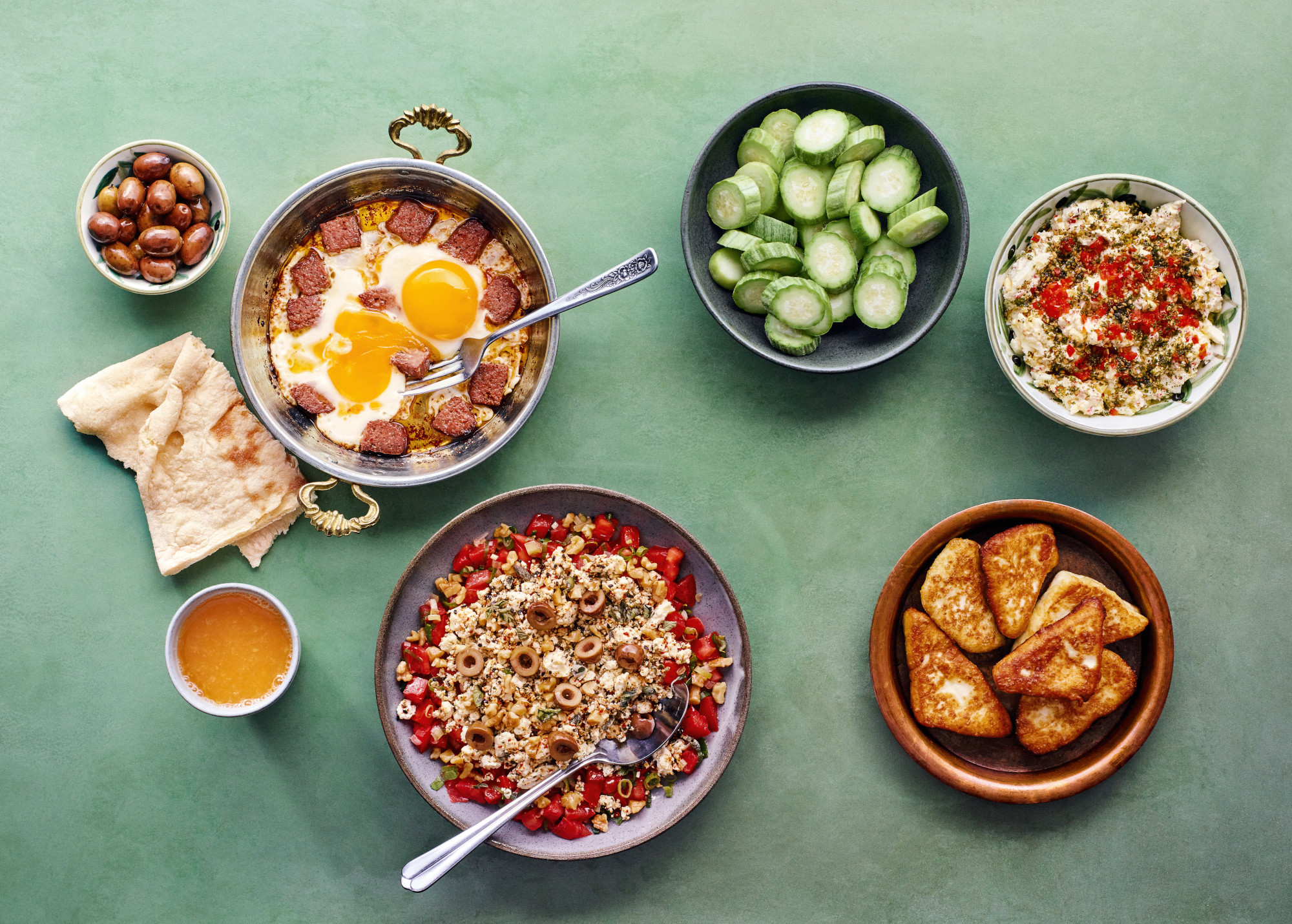 Dairy + Eggs: Sujuk Fried Eggs; “Secret” Shankleesh Salad; Fried Arabic White Cheese; Labaneh, Red Chili, and Egg Salad. Photography by Dan Perez