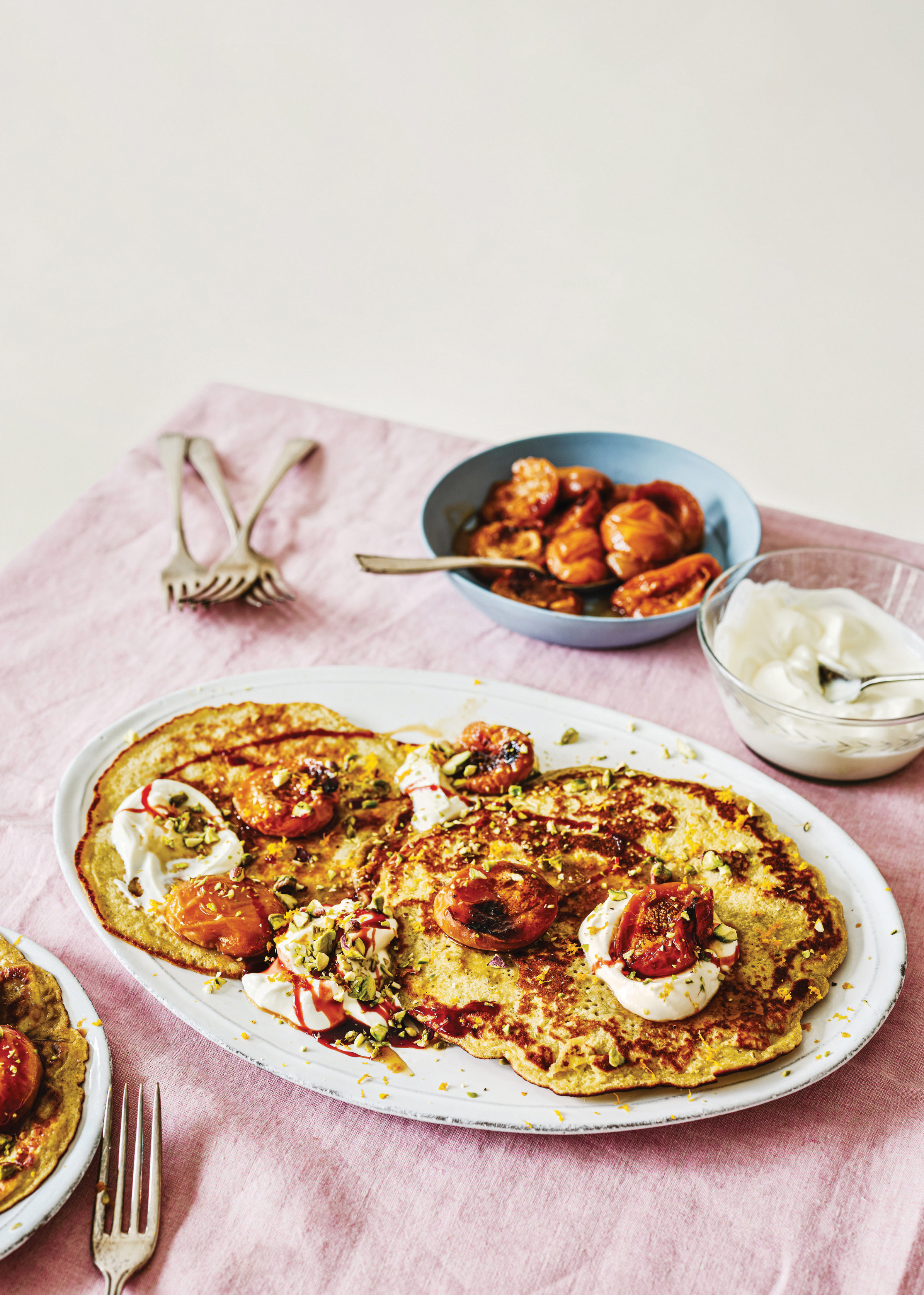 Pistachio Pancakes with Caramelized Apricots. Photography: Liz and Max Haarala Hamilton