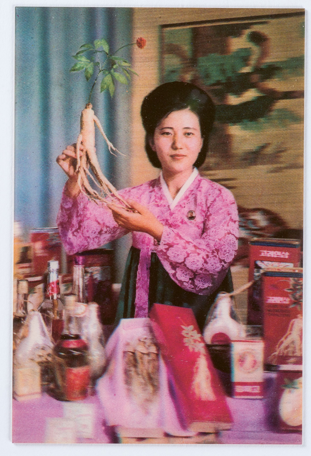 A 3D lenticular postcard extolling a plethora of beauty products aimed at women containing that most quintessential of North Korean panaceas – Kaesong Ginseng. From Made in North Korea