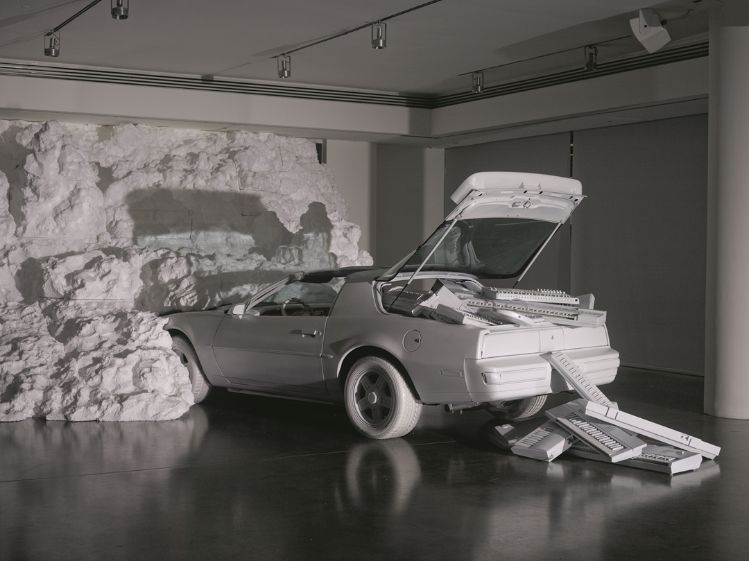 The White Room, 2013, EPS foam, custom matte white 1991 Pontiac Firebird, custom matte white instruments, 278.75m². Chromeo, New York, USA. Picture credit: photograph © Noah Kalina, courtesy of Snarkitecture