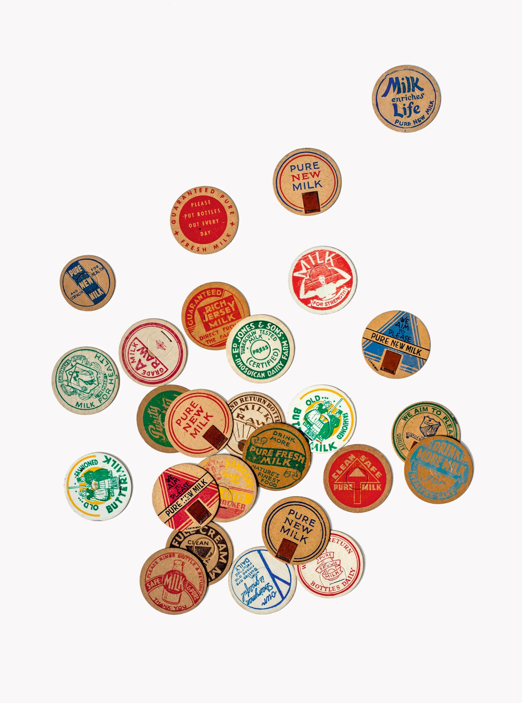 Milk-bottle Tops (England, 1950s), 1½ in. (3.8 cm) diameter, photograph by Flora Fricker, collection of Annie Atkins