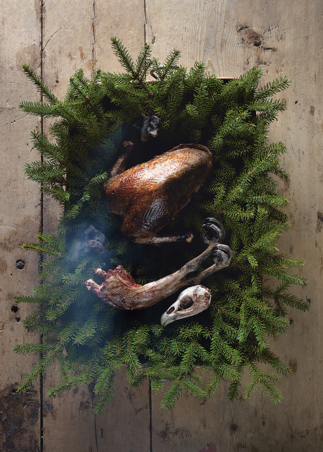 Bird’s head grilled over birch charcoal, from Fäviken: 4015 Days, Beginning. Photo by Erik Olsson 