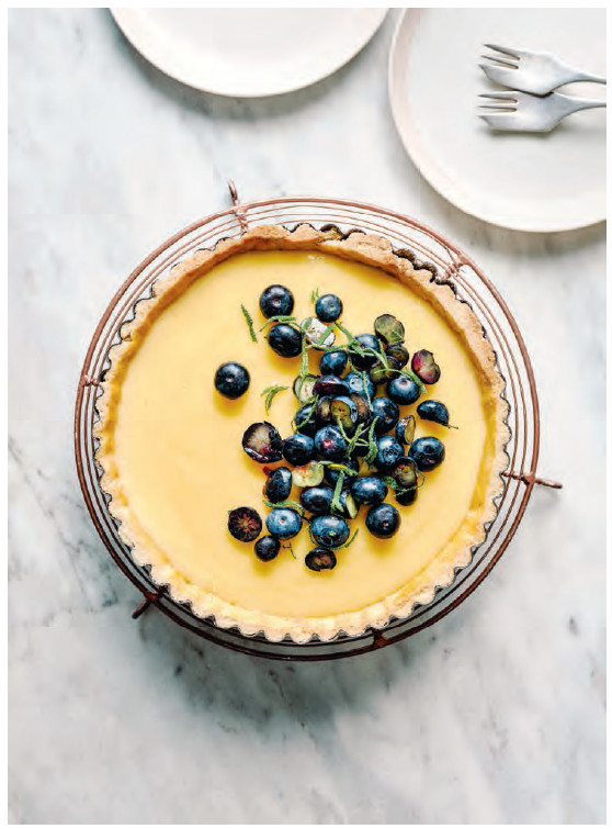 Lemon tart with sage and blueberries